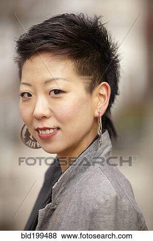Stock Photo - Smiling Korean woman. Fotosearch