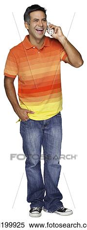 Stock Photography - Smiling man talking on telephone. Fotosearch