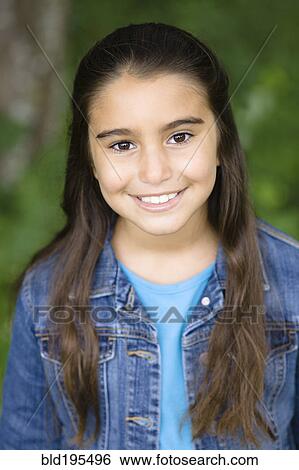 Stock Photograph - Smiling Middle Eastern girl. Fotosearch