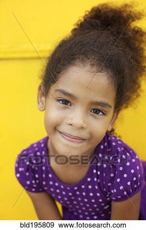 Stock Photo - Smiling mixed race girl. Fotosearch