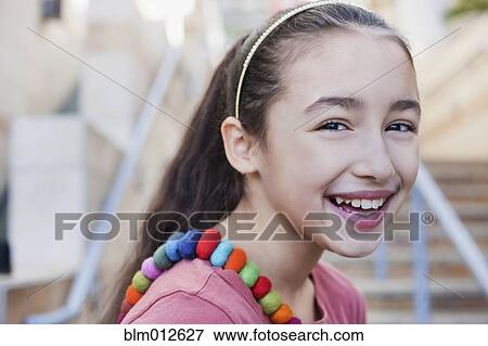 Stock Photo - Smiling mixed race girl. Fotosearch