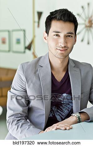 Smiling mixed race man in jacket View Large Photo Image Stock Image - Smiling mixed race man in jacket. Fotosearch