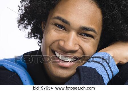 Picture - Smiling mixed race man. Fotosearch