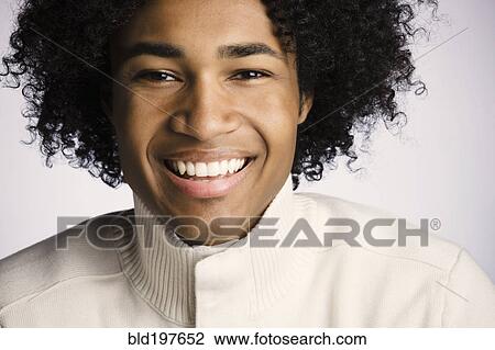 Smiling mixed race man View Large Photo Image Stock Image - Smiling mixed race man. Fotosearch