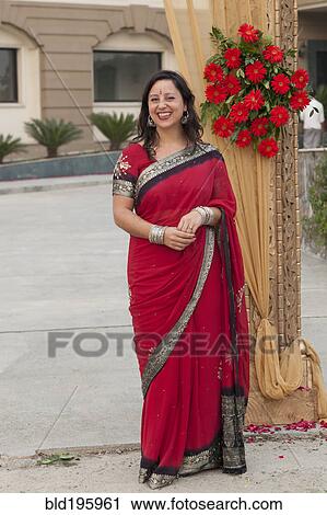 Smiling mixed race woman in Indian clothing View Large Photo Image Stock Image - Smiling mixed race woman in Indian clothing. Fotosearch