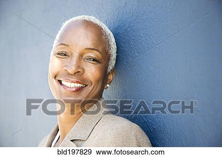 Smiling mixed race woman View Large Photo Image Stock Photo - Smiling mixed race woman. Fotosearch