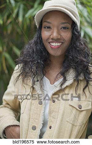 Stock Photography - Smiling mixed race woman. Fotosearch