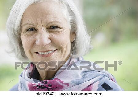 Stock Image - Smiling senior Caucasian woman. Fotosearch