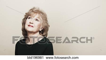 Stock Image - Smiling senior woman. Fotosearch