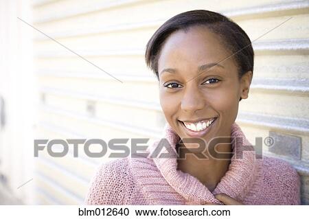 Stock Image - Smiling woman. Fotosearch