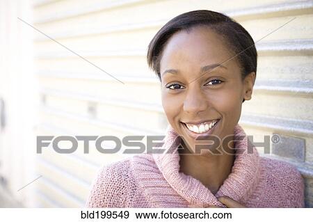 Stock Photo - Smiling woman. Fotosearch