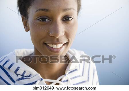 Stock Photo - Smiling woman. Fotosearch