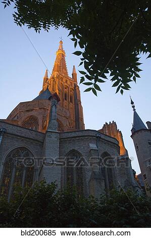Stock Photography - Spire and bell tower of cathedral. Fotosearch