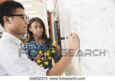 Stock Photography - Students learning about chemistry model. Fotosearch