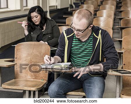 Picture - Students studying in classroom. Fotosearch