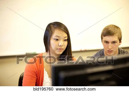 Students studying in computer lab View Large Photo Image Stock Image - Students studying in computer lab. Fotosearch