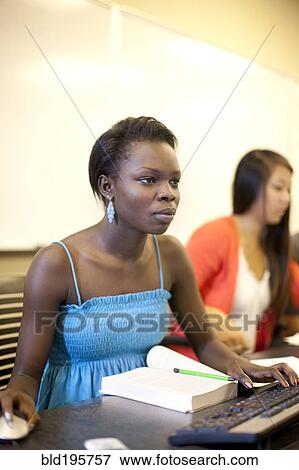 Students studying in computer lab View Large Photo Image Stock Photo - Students studying in computer lab. Fotosearch