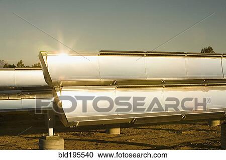 Sun shining on solar panels View Large Photo Image Stock Image - Sun shining on solar panels. Fotosearch