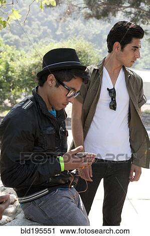 Stock Image - Teenage boys hanging out. Fotosearch