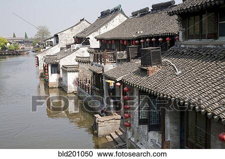 Stock Image - Traditional Suzhou houses on river. Fotosearch