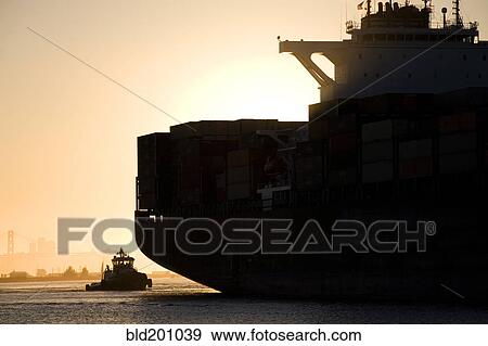 Tugboat and container ship in port of Oakland View Large Photo Image Stock Photo - Tugboat and container ship in port of Oakland. Fotosearch