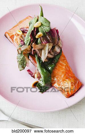 Stock Photo - Vegetables and salmon fillet. Fotosearch