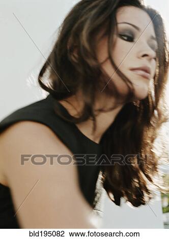 Stock Image - Woman with long hair. Fotosearch