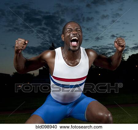 Stock Image - African American athlete shouting. Fotosearch
