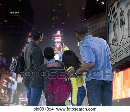 Picture - African American family enjoying urban city. Fotosearch