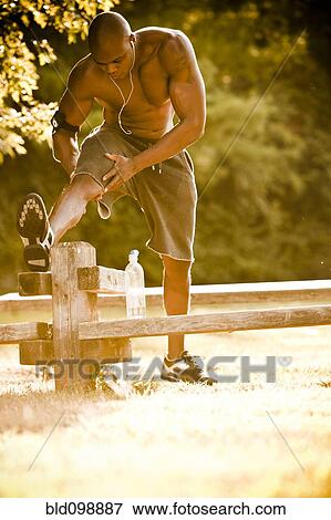 African American man stretching before exercise View Large Photo Image Stock Photo - African American man stretching before exercise. Fotosearch