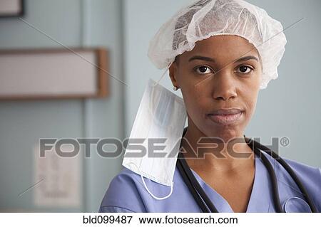 Black surgeon in surgical cap and mask View Large Photo Image Stock Photo - Black surgeon in surgical cap and mask. Fotosearch