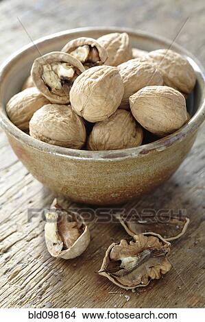Picture - Bowl full of walnuts. Fotosearch