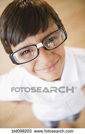 Boy wearing eyeglasses repaired with tape View Large Photo Image Stock Image - Boy wearing eyeglasses repaired with tape. Fotosearch