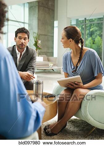 Business people meeting in lobby View Large Photo Image Stock Image - Business people meeting in lobby. Fotosearch