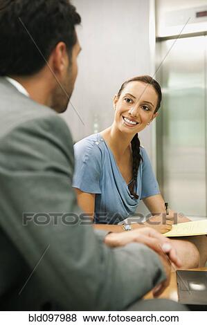 Business people working together View Large Photo Image Stock Photo - Business people working together. Fotosearch
