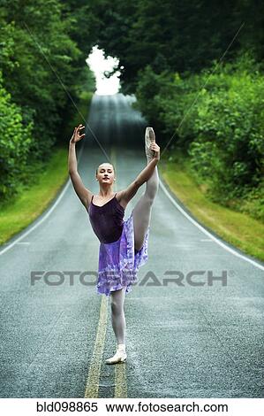 Caucasian ballerina dancing on remote road View Large Photo Image Stock Photography - Caucasian ballerina dancing on remote road. Fotosearch