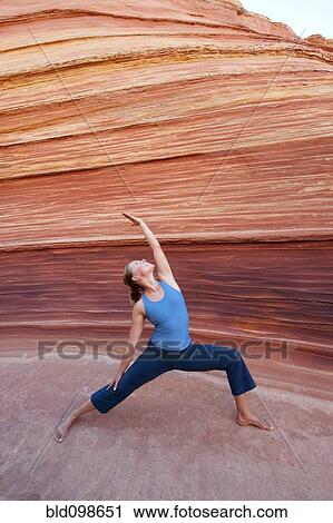 Caucasian woman practicing yoga outdoors View Large Photo Image Stock Image - Caucasian woman practicing yoga outdoors. Fotosearch