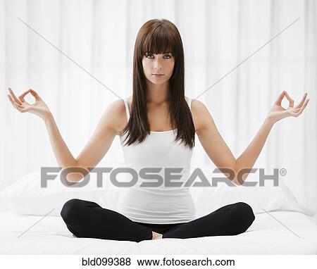 Caucasian woman practicing yoga View Large Photo Image Stock Photo - Caucasian woman practicing yoga. Fotosearch