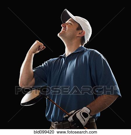 Stock Image - Cheering golfer holding golf club. Fotosearch