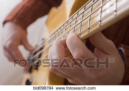 Picture - Chilean man playing guitar. Fotosearch