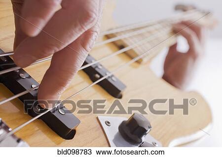 Stock Image - Chilean man playing guitar. Fotosearch
