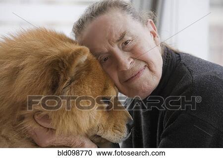Chilean woman hugging dog View Large Photo Image Stock Image - Chilean woman hugging dog. Fotosearch