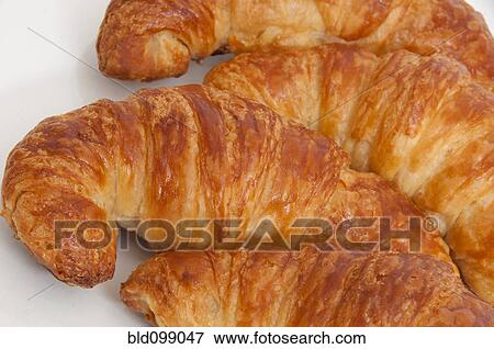 Stock Photo - Close up of fresh croissants. Fotosearch