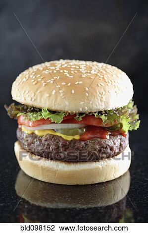 Stock Image - Close up of hamburger. Fotosearch