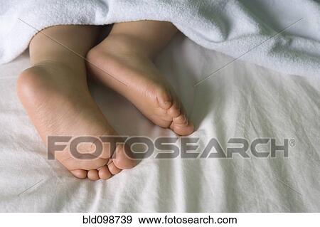 Close up of Hispanic baby boy's feet View Large Photo Image Stock Photo - Close up of Hispanic baby boy's feet. Fotosearch