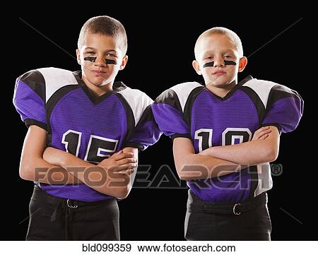 Stock Photo - Football players with arms crossed. Fotosearch