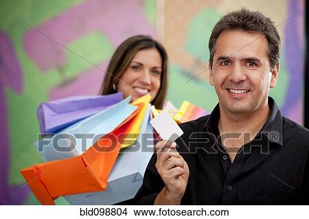 Picture - Hispanic couple shopping together. Fotosearch
