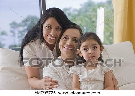 Stock Photography - Hispanic grandmother, mother and daughter. Fotosearch