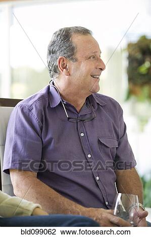 Hispanic man drinking wine View Large Photo Image Stock Image - Hispanic man drinking wine. Fotosearch