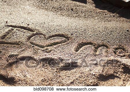 I heart me written in the sand View Large Photo Image Stock Photo - I heart me written in the sand. Fotosearch